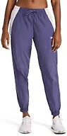 Reebok Women’s BV Woven Pant, Standard Fit, 29” Inseam, Lightweight Nylon Crinkle Woven Fabric, Twilight Purple, Large